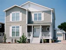 Open floor plan narrow lot custom designed modular home with 4 or 5 bedrooms, 3 full baths at the Jersey Shore.